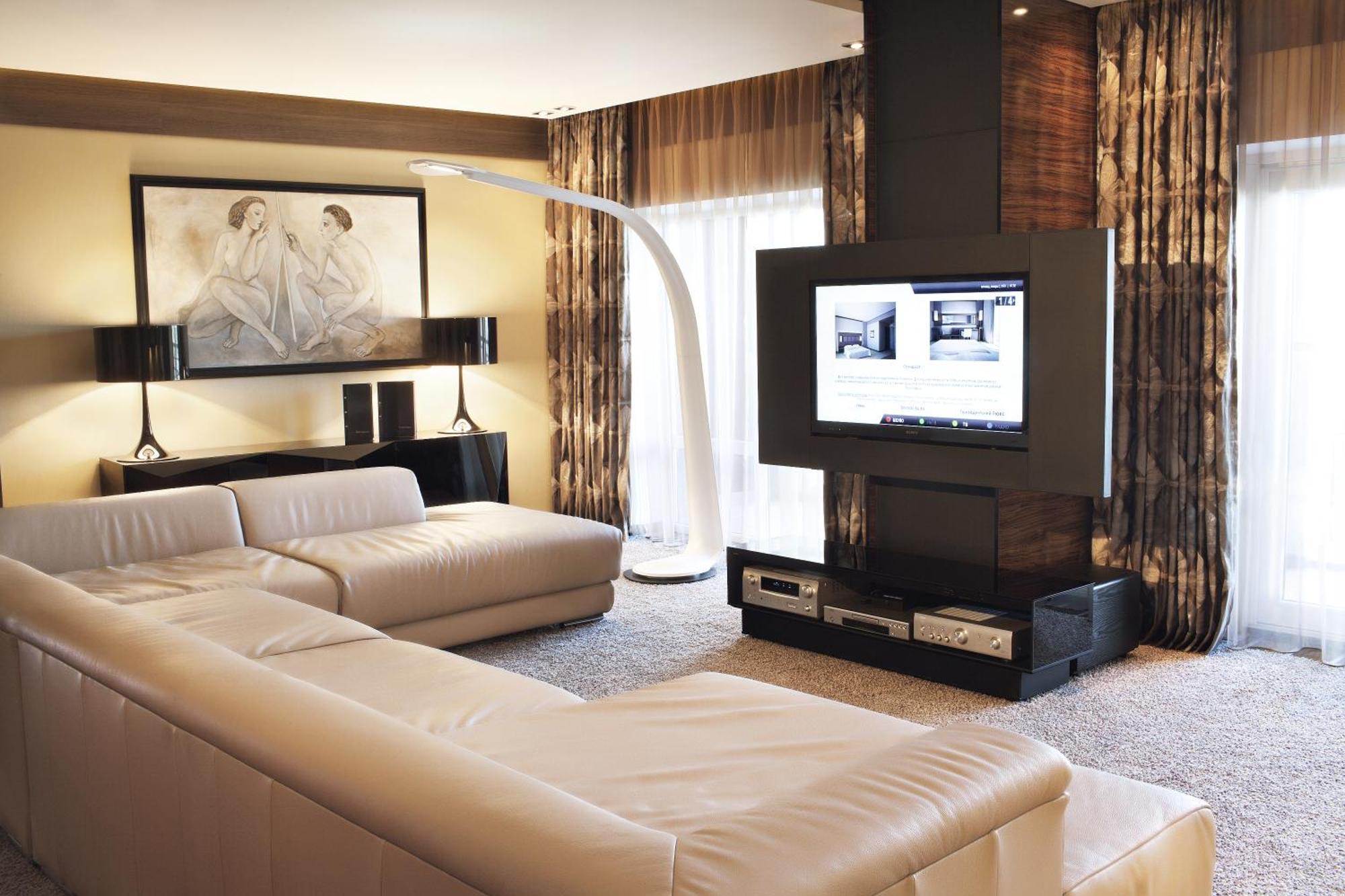 Mirotel Resort And Spa Truskavets Exterior photo A living room with a television