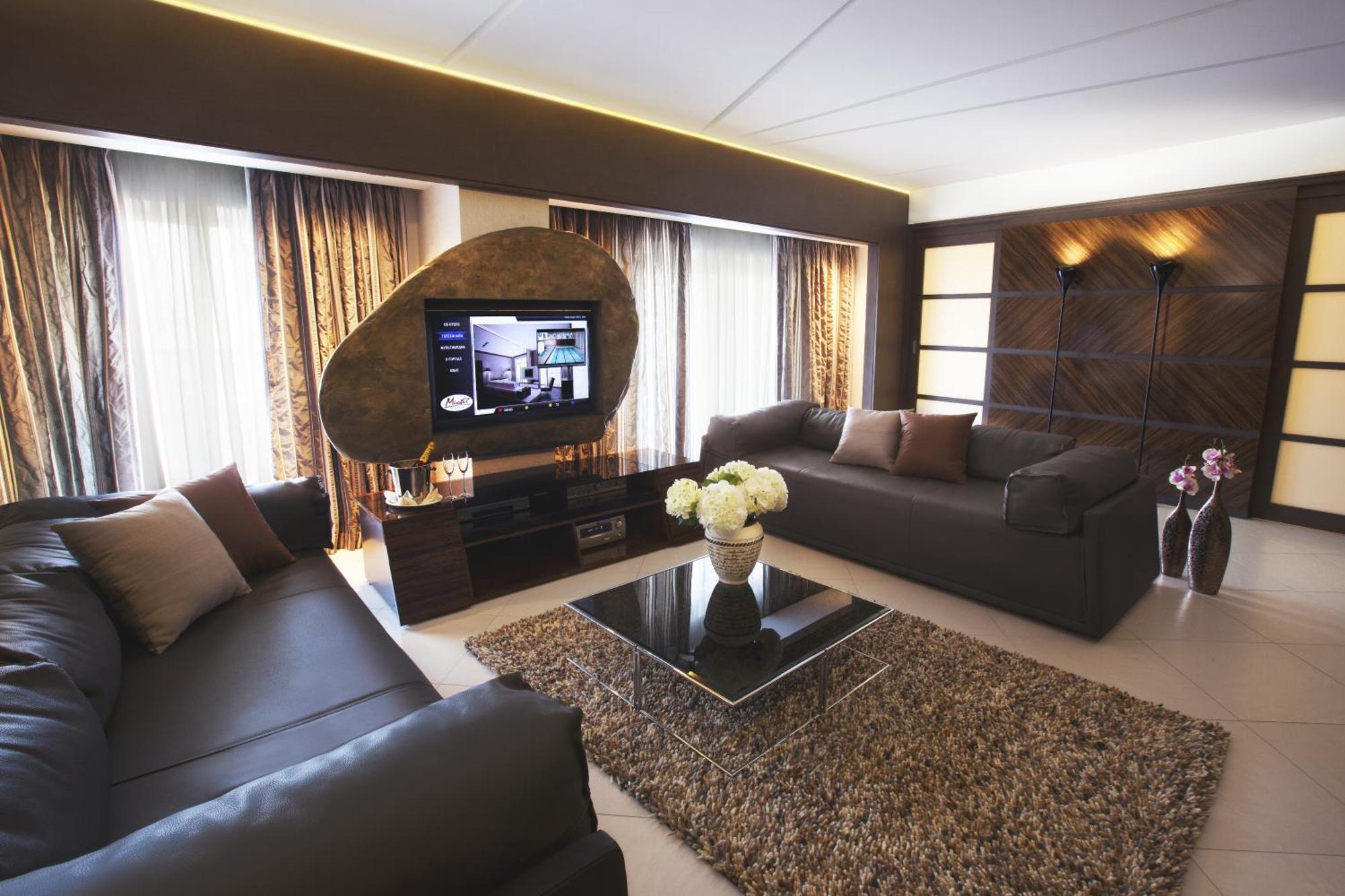 Mirotel Resort And Spa Truskavets Exterior photo A living room in a suite at the hotel