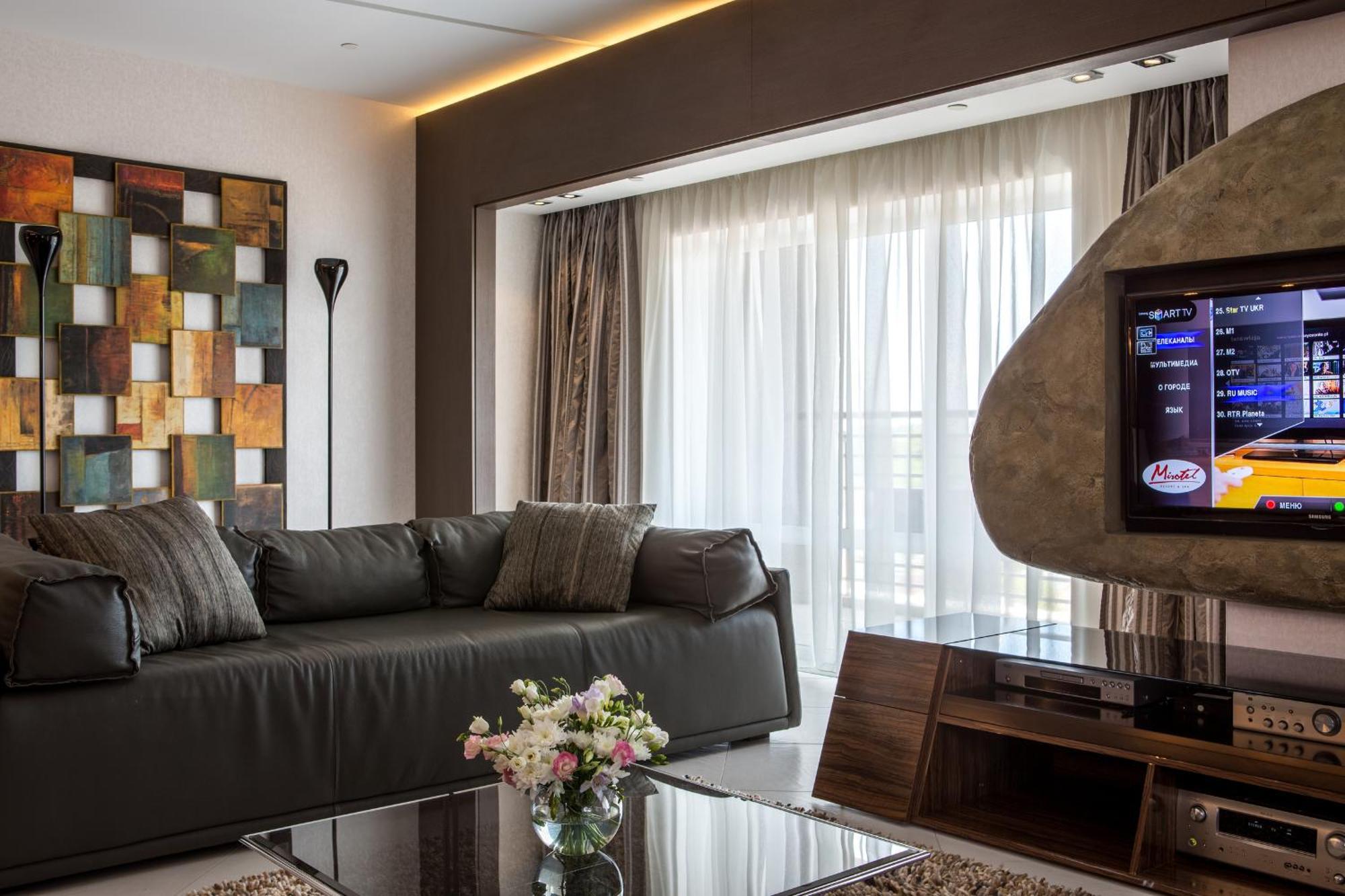 Mirotel Resort And Spa Truskavets Room photo A living room with a television